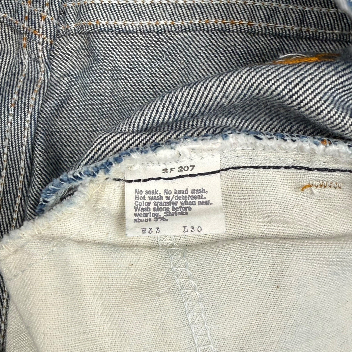 1970s Dark Wash Levis Orange Tab Bell Bottom Dark Wash Denim Jeans